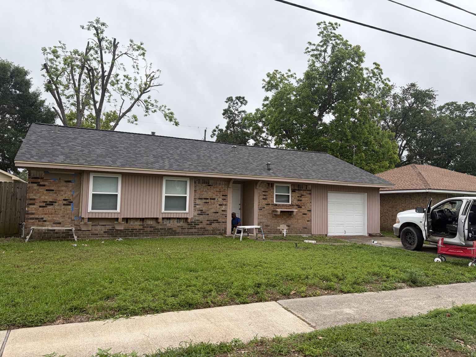 Exterior home before painting and improvements